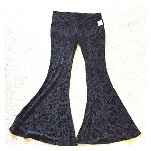 Black stretchy bell bottoms, size L